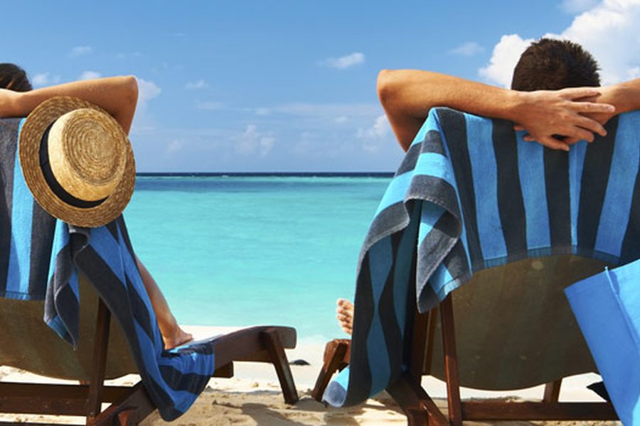Couple relaxing at the beach